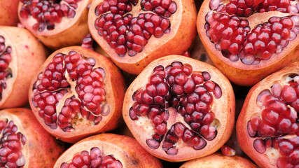 Sliced pomegranate fruits at the bazaar of Turkey.
