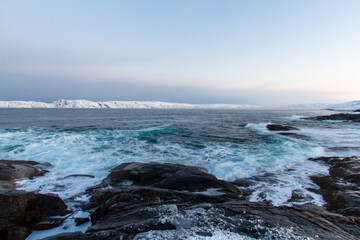 Winter view of the shore of the Arctic Ocean. General view of the day on the shore of the Arctic Ocean.