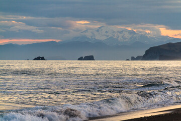 View of the Pacific coast during a sunny sunset on a clear sunny day.