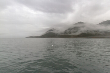 View of the sea bay during bad weather, fog, rain, strong wind