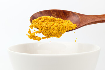 Curry powder on white background