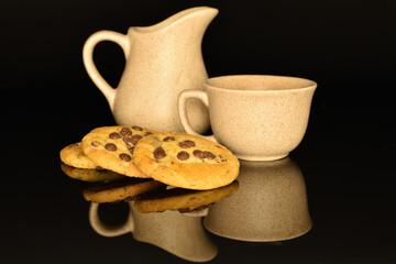 Homemade cookies with chocolate, close-up, on a white background.