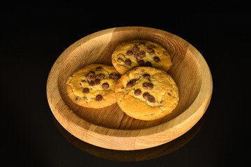 Homemade cookies with chocolate, close-up, on a white background.