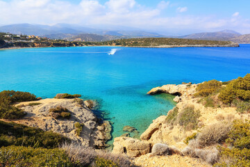 Fototapeta na wymiar Island Crete, Greece. Empty beach with no travellers and tourists. Beautiful summertime view seascape. 2020 summer travel. Vacation cancellation, closed beaches. Romantic relax places.