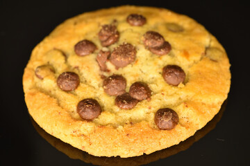 Homemade cookies with chocolate, close-up, on a white background.