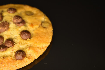 Homemade cookies with chocolate, close-up, on a white background.