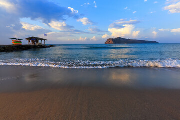 Island Crete, Greece. Empty beach with no travellers and tourists. Beautiful summertime view seascape. 2020 summer travel. Vacation cancellation, closed beaches. Widescreen frame backdrop.
