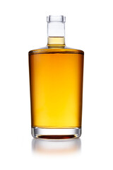 A full angular shaped bottle of golden whisky, with no label or branding, isolated on white