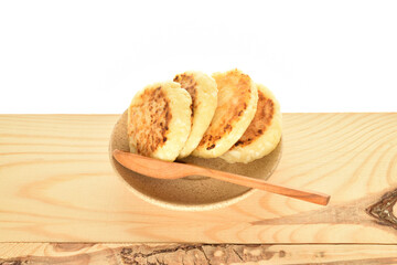 Homemade cheesecakes, close-up, on a white background.
