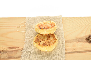 Homemade cheesecakes, close-up, on a white background.
