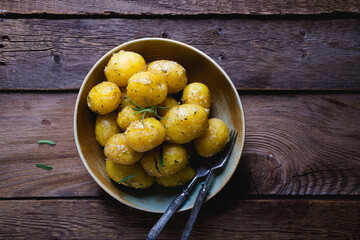 Baked potatoes with herbs and garlic