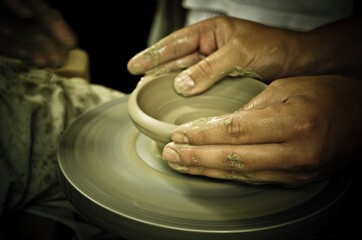 hands of a potter at work