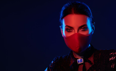 Stylish woman model  wearing designer cloth  face mask protect against coronavirus. Reusable fashionable face mask.