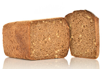 Slices of black cereal bread, close-up, on a white background.
