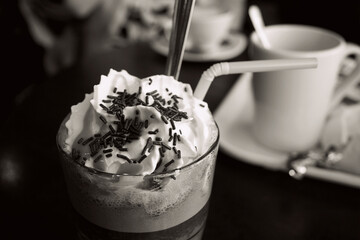 Coffee or hot chocolate with cream. Sweet café time. Autumn delicacy.