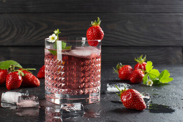 Fresh strawberry cocktail with ripe strawberries and ice cubes.Strawberry lemonade.Close up.