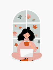 Vector brunette woman drinking a cup of tea or coffee and working on laptop by window with autumn leaves