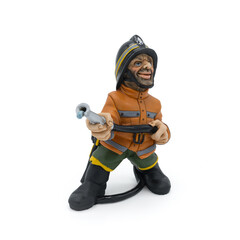 Children's toy firefighter close up on a white background