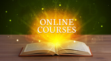 ONLINE COURSES inscription coming out from an open book, educational concept