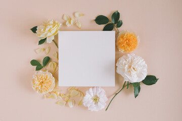 Framework for photo or congratulation. Blank paper mock up with floral composition.