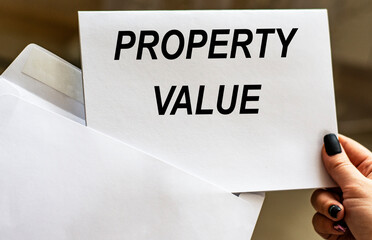 PROPERTY VALUE words written in letter from envelope