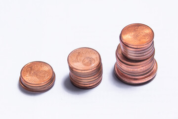 copper coins stockpiled in 3 columns seen from above