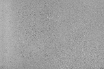 White textured wall: Wall of a house lit by natural light