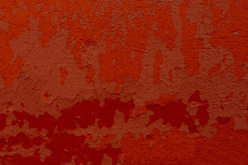 Finely cracked texture red paint. Rusty metal wall background