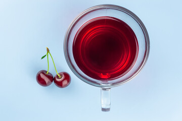 A cup of cherry kampot and two cherries