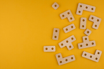 Children's wooden toy sorter close up with copy space. Concept of educational games and tetris. Copy space