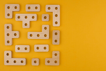 Children's wooden toy sorter close up with copy space. Concept of educational games and tetris. Copy space