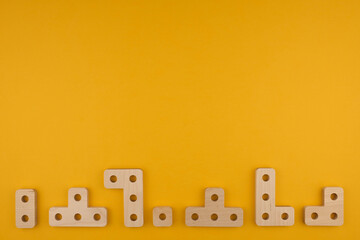 Children's wooden toy sorter close up with copy space. Concept of educational games and tetris. Copy space