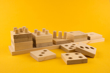 Children's wooden toy sorter. Educational logic toys for kid's close-up. Montessori Games for child development