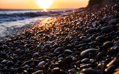 Fototapeta premium Pebble beach sunset in Russia