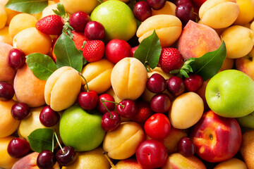 fresh ripe fruits and berries as background