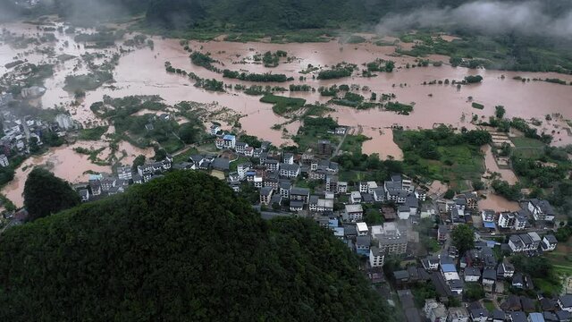 Chinese town submerged in water, Guangxi flooding natural disaster, aerial