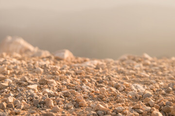 Many small rocks in the mountains. Sunset