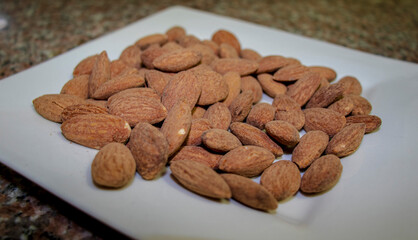 Closeup shot of a salted almonds