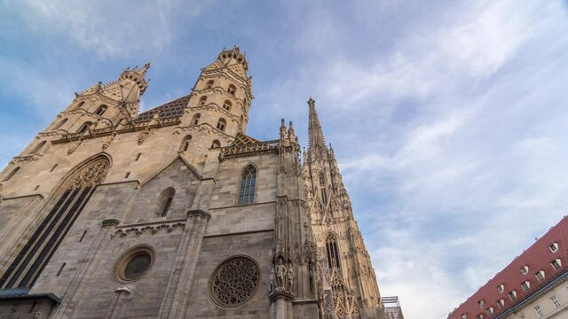 St. Stephen's Cathedral timelapse hyperlapse (Stephansdom, Domkirche St. Stephan), the mother church of Roman Catholic Archdiocese of Vienna and one of the tallest churches in the world, Stephansplatz