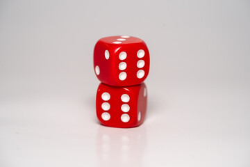 two red dices on a white background