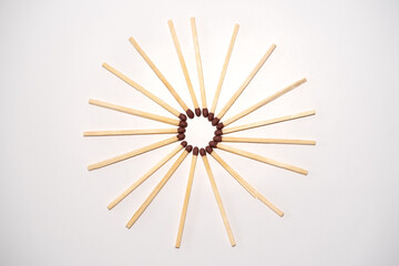 Matches in a circle on a white background