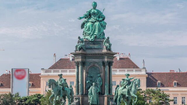 Empress Maria Theresia Monument timelapse and Museums Quartier on a background in Vienna, Austria. Famous Natural History Museum with park and sculptures near in Vienna, Austria