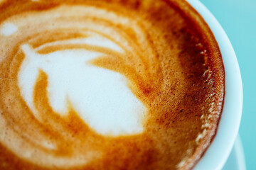 Abstract cappuccino coffee background, mug, foam, white cup, close up.