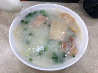 Delicious boiled rice poridge or congee with slice fish in the Cantonese restaurant in Hong Kong