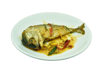 spicy fried mackerel fish with chili and curry on plate