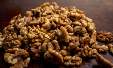 Closeup shot of a walnuts on wooden table