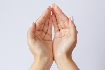 Gesture and symbol. Woman hands are asking for help. The concept of poverty. Hands offer help