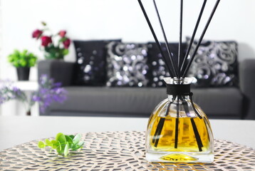 The luxury scented aroma room fresherner reed diffser glass bottle with black fiber sticks in the...