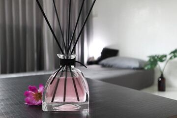 The luxury scented aroma room fresherner reed diffser glass bottle with black fiber sticks in the...