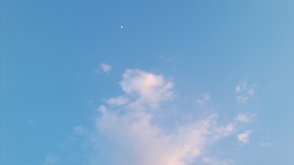 The sky and white clouds in the daytime.